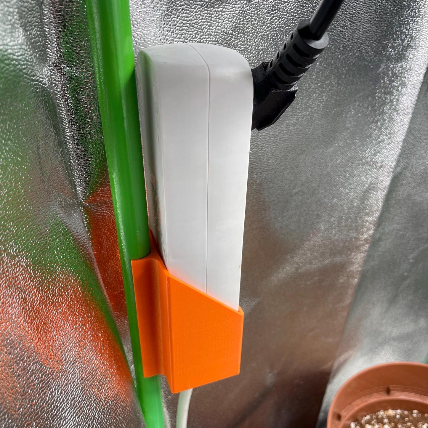 Socket holder for grow tent poles